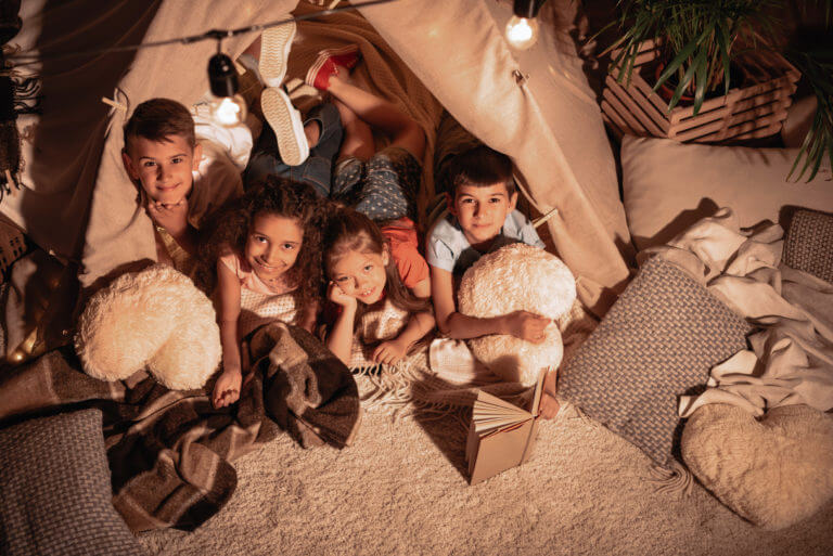 family sleepover party with teepee tents during COVID-19